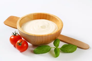 Foto auf Leinwand Creamy sauce in wooden bowl © Viktor