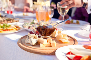 Cheese plate on the festive table
