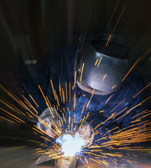 Worker welding