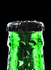 Bottle of beer on black background