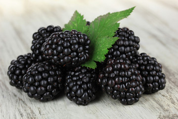 Sweet blackberries on table close-up