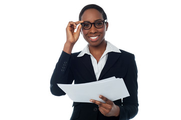 Manager reviewing documents