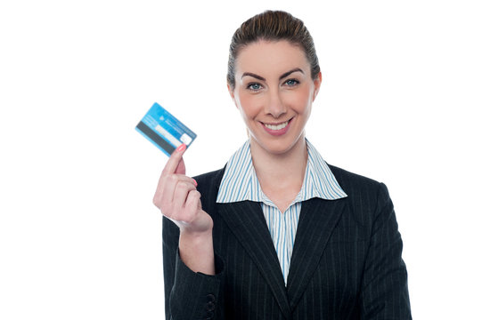 Businesswoman showing her cash card