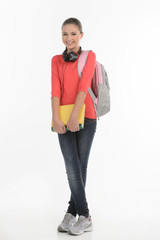 Fototapeta premium Happy schoolgirl. Happy teenage schoolgirl holding with book bag