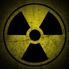 Fototapeta premium Ionizing radiation hazard symbol on grunge texture.