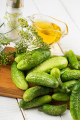 Fresh cucumbers on wooden background
