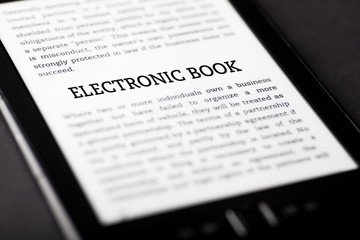 Electronic book on tablet touchpad, ebook concept