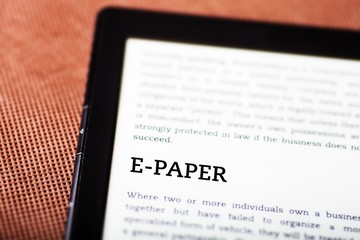 Obraz premium E-paper on ebook, tablet concept