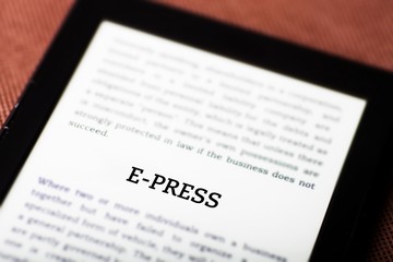 Obraz premium E-press concept on tablet ebook