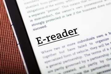 Obraz premium E-reader on tablet screen, ebook concept
