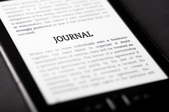Journal on tablet touchpad, ebook concept