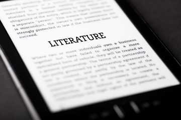 Obraz premium Literature book on tablet touchpad, ebook concept