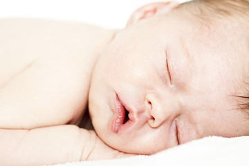 Newborn baby peacefully sleeping