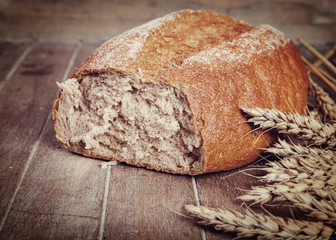 Delicious bread on a wood table