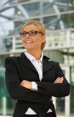 Confident businesswoman with glasses