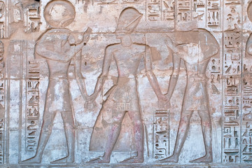 Ancient Egyptian hieroglyphic carving in Medinet Habu