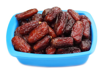 Fresh Arabian Dates on a blue bowl