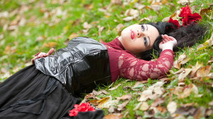 Gothic girl in the autumn park