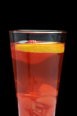 Cold fruit tea with an orange