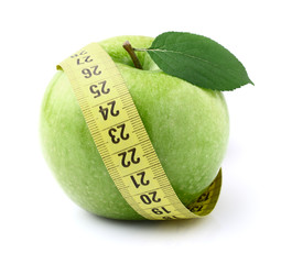 Green apple with centimeter