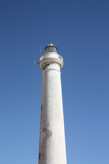 Fototapeta na wymiar Day view of a old lighthouse