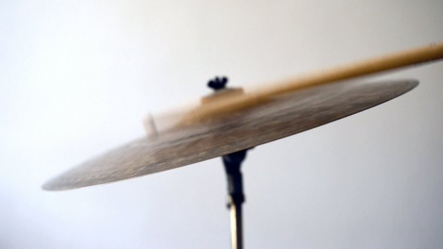Cymbal gets hits from the drum stick