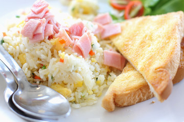 Fried rice with ham, served with toast