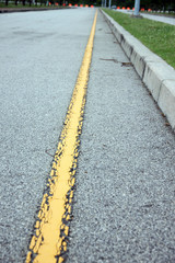 Fototapeta premium Yellow line of the road.