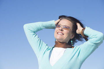 Attractive positive mature woman outdoor