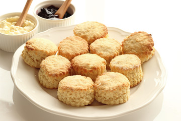 Home-baked scones with clotted ceam and blackcurrant jam