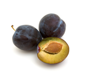 plums isolated on white background
