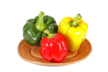 sweet pepper in dish  isolated on white background