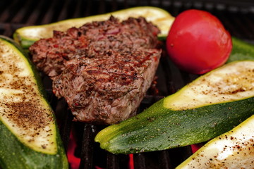 Grilled beef with zucchini and tomato. BBQ