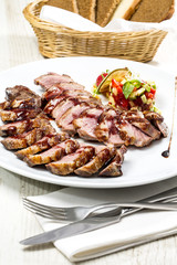 roasted meat on the table in a restaurant