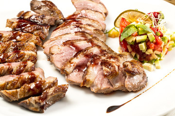 roasted meat on the table in a restaurant
