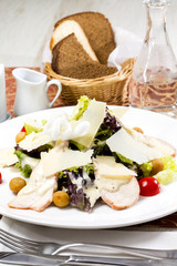 Fototapeta na wymiar Caesar salad on the table in a restaurant