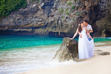 modern fashioned wedding on the beach of bali