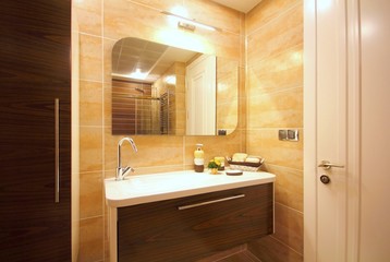 A modern brown bathroom