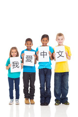 group kids holding paper saying i love chinese