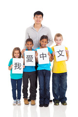 chinese teacher standing with group of students
