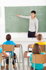 chinese teacher teaching group of elementary school students