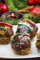 Round shape chocolate christmas cakes, decorated with jelly stri