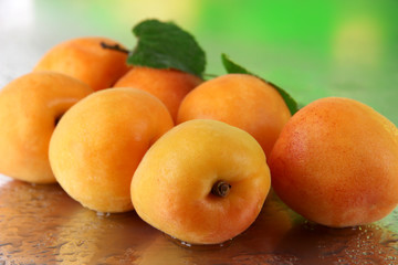 Apricots on nature background