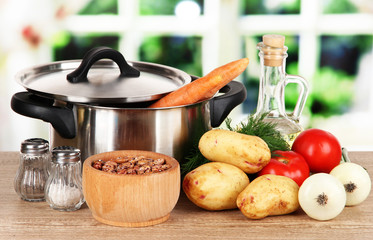 Ingredients for cooking borsch on table in kitchen
