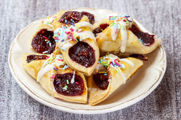 Delicious cakes filled with marmalade, decorated with icing