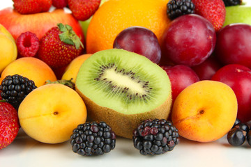 Naklejka na ściany i meble Fresh fruits and berries close up