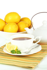 Cup of tea with lemon close-up