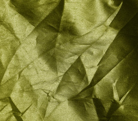 crumpled yellow fabric background