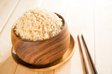 Cooked organic basmati brown rice with chopsticks