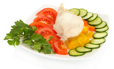 Boiled chicken breast on plate with vegetables isolated on